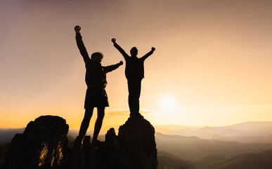 Concept of business, Silhouette of the team on the mountain. Leadership Concept