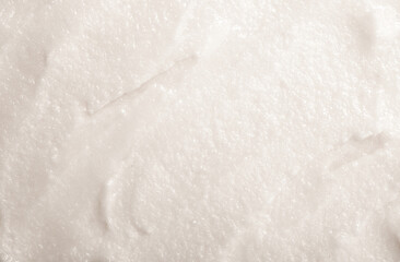 Baby food close-up. Porridge for newborns. Background food texture for kids. Milk mixture.