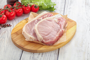 Raw pork t-bone steak for grill