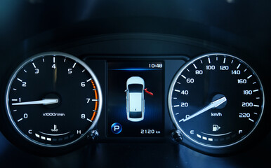 Fototapeta premium A low light picture with noise effect of car dashboard meter with door open indicator.