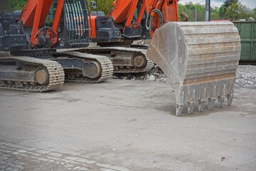 demolition of a building with excavators and construction machinery. 