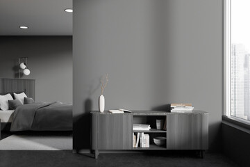 Grey bedroom interior with bed and sideboard near window. Mockup wall