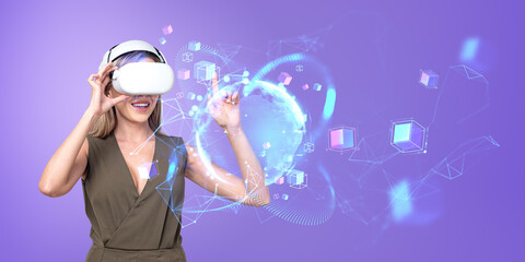 Woman in VR glasses working with planet interface in metaverse