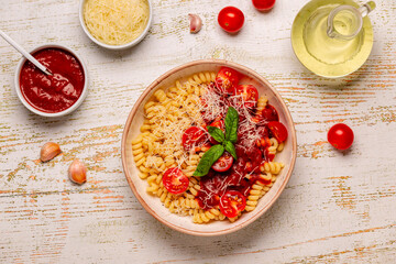 Homemade pasta with tomato sauce, top view.