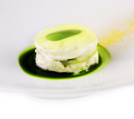 White airy cream-mousse dessert with apple syrup