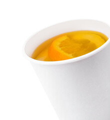 tea with orange slices in a plastic cup
