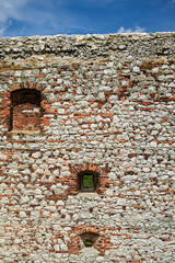 Fragment of a stone defensive wall of a medieval castle in Olsztyn
