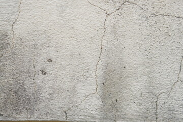 Old cement wall background, faded color