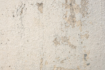 Old cement wall background, faded color