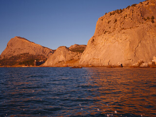 Fototapeta na wymiar Rocks on the Black Sea. Sunrise