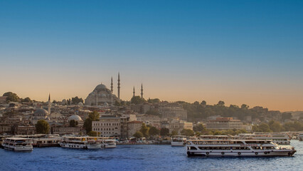 Eminonu Harbor with Fatih Mosque, Istanbul Turkey . Travel concept and sea front view