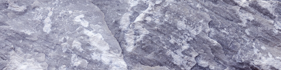 Banner 4x1 from the picture of limestone natural stone of pastel milky blue color with cracks