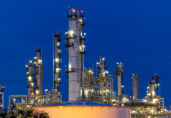 Plakat Oil and gas refinery plant firm industry zone at night.Oil and gas Industrial petrochemical fuel power and energy.Chemical Industry.Gas storage tanks and oil storage tank in refinery industrial plant.