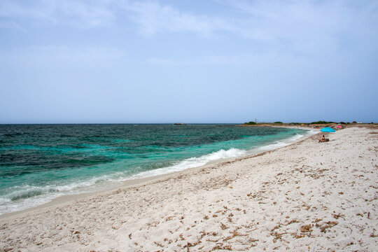 white quartz sand and crystal clear water in Mari Ermi beach, Cabras, Oristano, Sardinia
