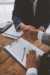 Handshake of real estate brokers with customers or investors, mortgage loan agreements Make a...