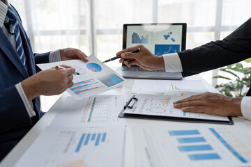 business people meeting in the office Calculate company tax and investment income Strategic planning and colleague brainstorming. Reports. Analyze charts. team work concept.