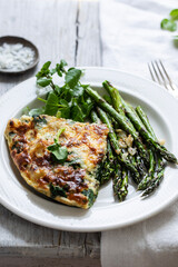 Spinach and potato fritatta with roasted asparagus