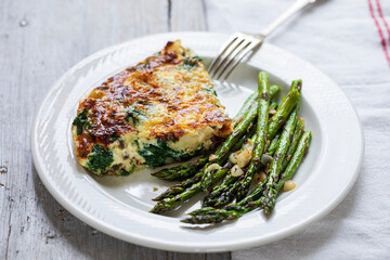 Spinach and potato fritatta with roasted asparagus