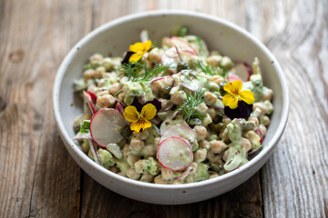 Chickpea salad with avocado, pickled onion and radishes