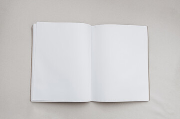 Empty Book on Canvas Texture Background, Open Diary or Notebook mockup with white paper blank...