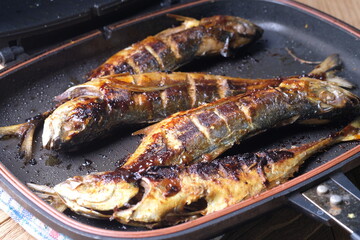 Teflon grilled skipjack. fish baked in a teflon-coated pan. Ikan cakalang bakar. Indonesian food. 

