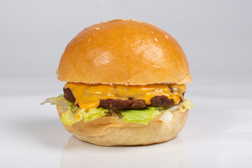 Beef burger with fries, on white background