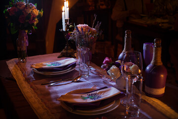 Wedding decor in darkness. Wedding interior. Festive decor. Table decor. Table layout. Restaurant interior.