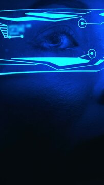 The close up view on a woman in futuristic glasses in darkness. slow motion