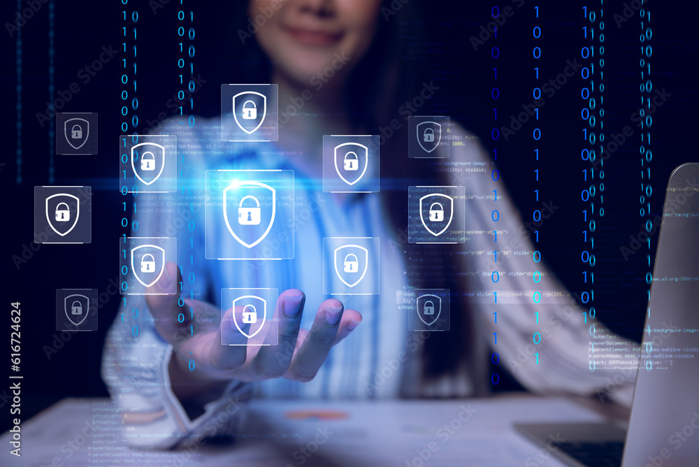 Fototapete Cybersecurity and privacy concepts to protect data. Lock icon and internet network security technology. woman protecting personal data on smart   phone and laptop with virtual screen interfaces