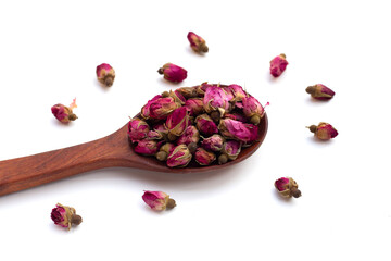 Dried roses for tea on white background.
