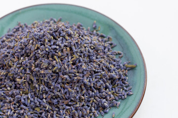 Dried lavender flowers on white background.