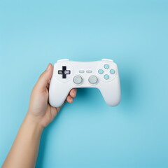 hand holding game controller isolated on plain blue studio background made with generative ai