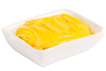 Ceramic sauceboat with yellow mustard sauce