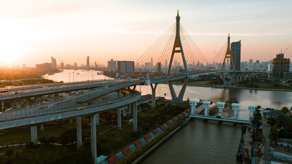 Bridge view from the top view of the drone Thailand, Car transport bridge, and river landscapes bird's eye view during sunset