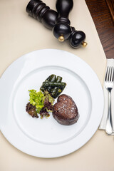 A delicious meat dish from a restaurant. Close up
