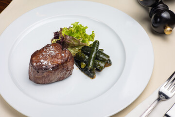 A delicious meat dish from a restaurant. Close up