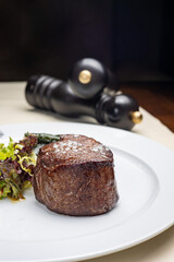 A delicious meat dish from a restaurant. Close up