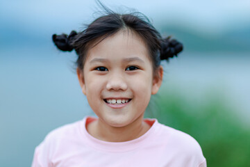 Innocent Smiles Children : Portrait of an Asian Girl, 6-8 Years Old kid.