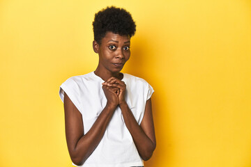 Elegant African woman, short hair, white tank top, Elegant African woman, short hair, white tank...