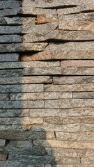The arrangement of natural stones installed to decorate the house wall