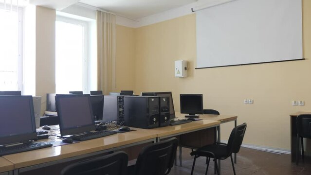 Row Of Computers In An Empty Classroom, Office Room
