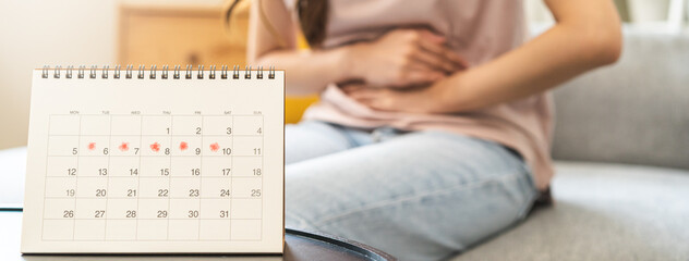 Menstruation, period cycle day of monthly, hurt asian young woman, female hand in stomach ache,...