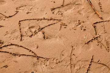inscriptions on the sand