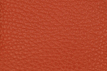 red leather textured background close-up