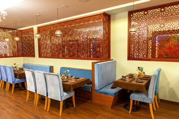 Interior of traditional Indian restaurant with simple design