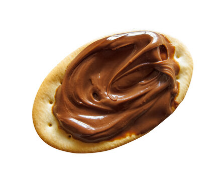 oval biscuits of bread, with spreadable chocolate cream, isolated on white - top view
