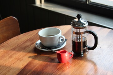 cafe coffee cup and cafeteria on table