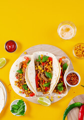 Mexican Tacos with Beef and Vegetables, Tacos al Pastor on Yellow Background