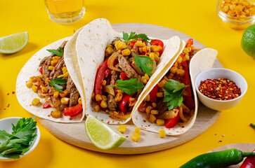 Mexican Tacos with Beef and Vegetables, Tacos al Pastor on Yellow Background
