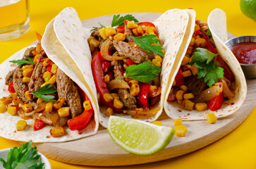 Mexican Tacos with Beef and Vegetables, Tacos al Pastor on Yellow Background
